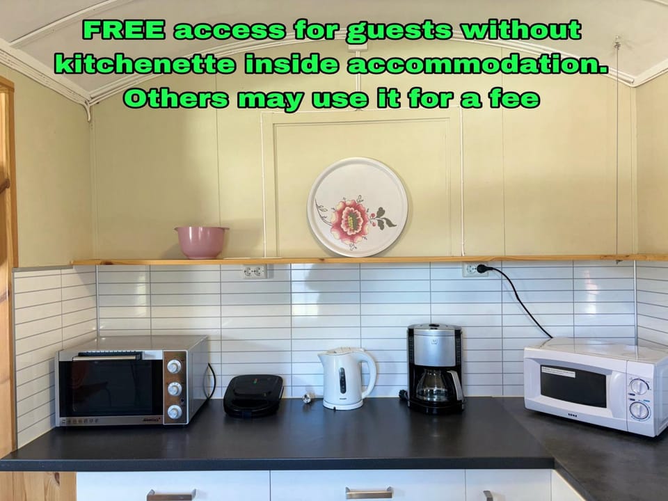 Coffee/tea facilities, Kitchen or kitchenette, Text overlay, minibar, toaster