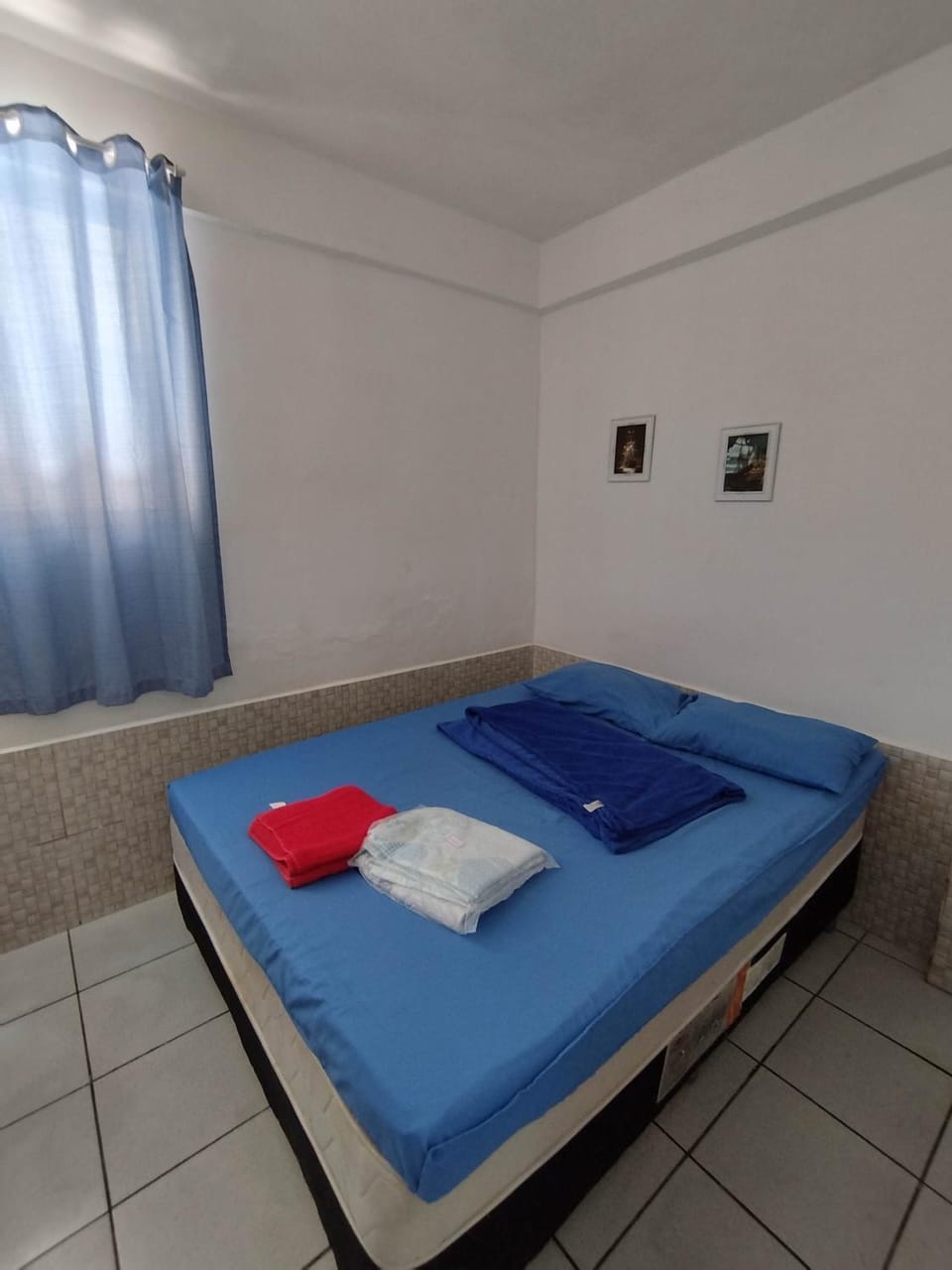 Seu Apto Praia da Costa 2 Sala Quarto Banheiro 1 Cama casal e 2 Camas Solteiro Econômico Local Excelente Ar Cond Frigobar Microondas Tv Todo Seu Centro Apartment in Vila Velha