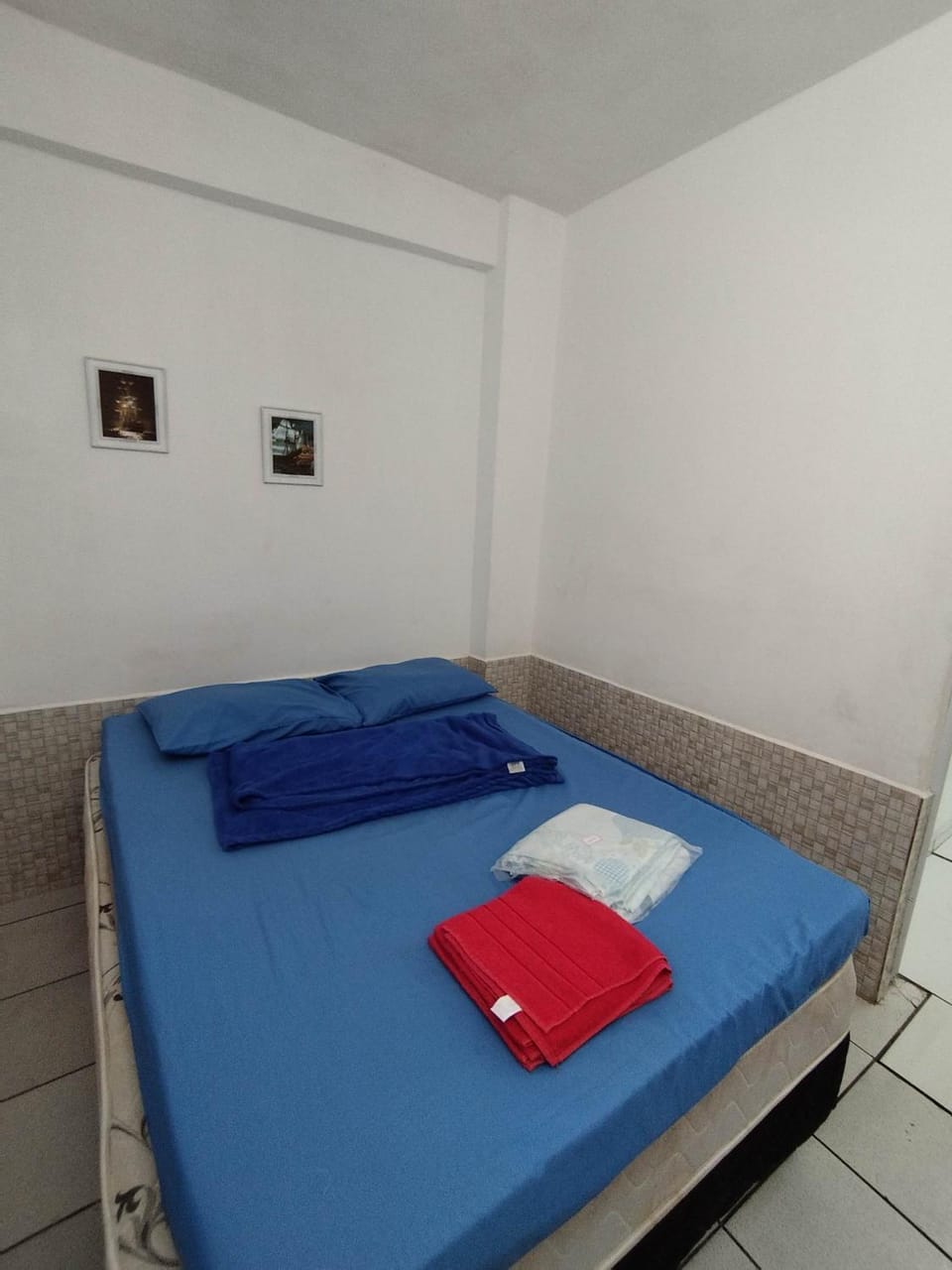 Seu Apto Praia da Costa 2 Sala Quarto Banheiro 1 Cama casal e 2 Camas Solteiro Econômico Local Excelente Ar Cond Frigobar Microondas Tv Todo Seu Centro Apartment in Vila Velha