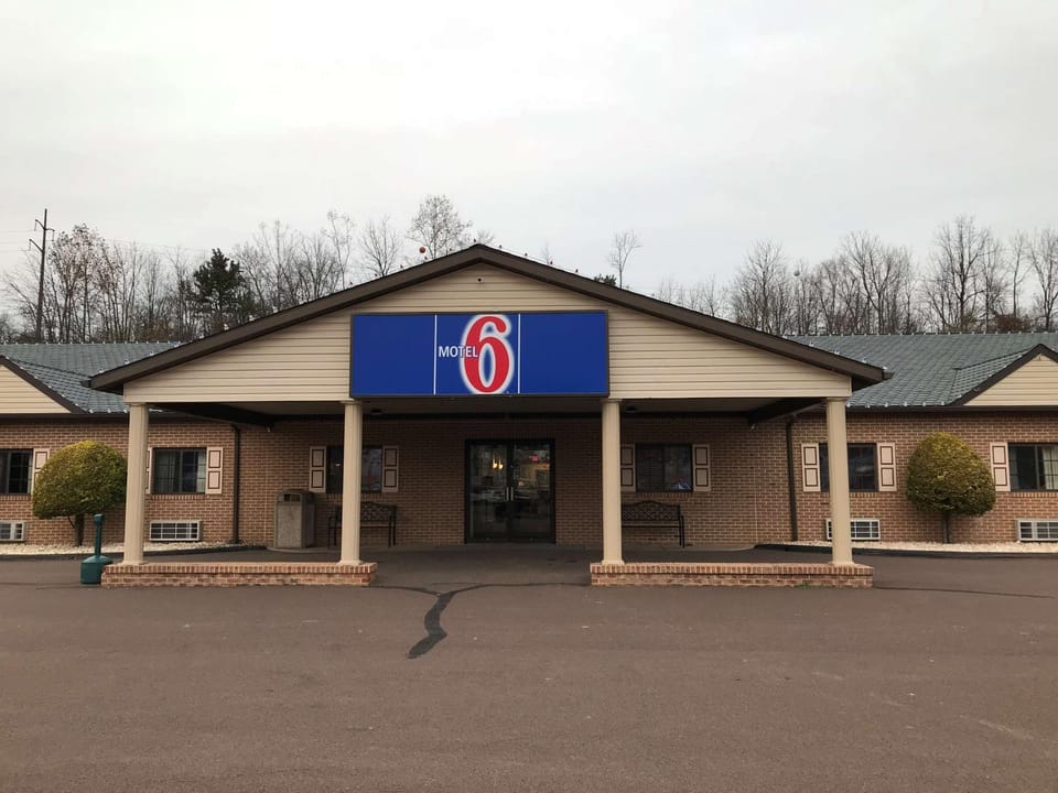 Property building, Facade/entrance, Property logo or sign, On site, Time of day, Sunset