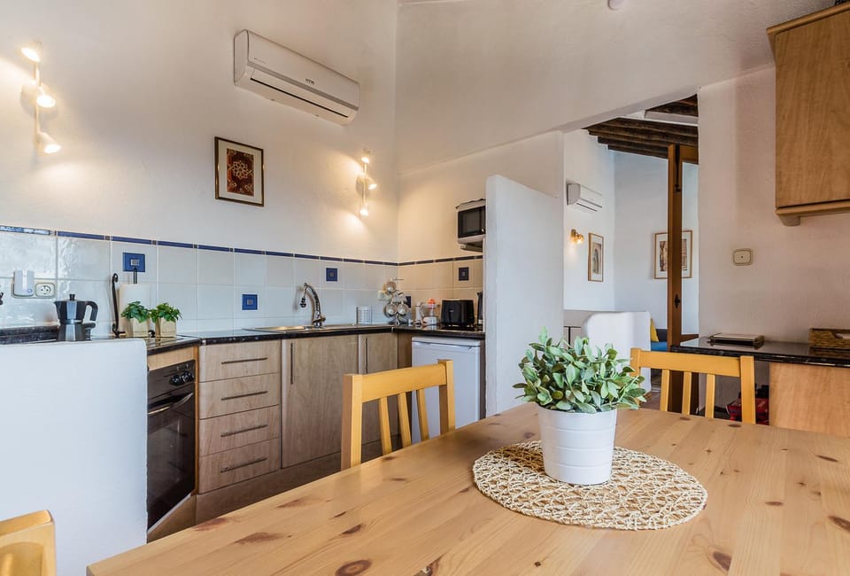 Dining area, Mountain view, Pool view, microwave, oven, stove, air conditioner