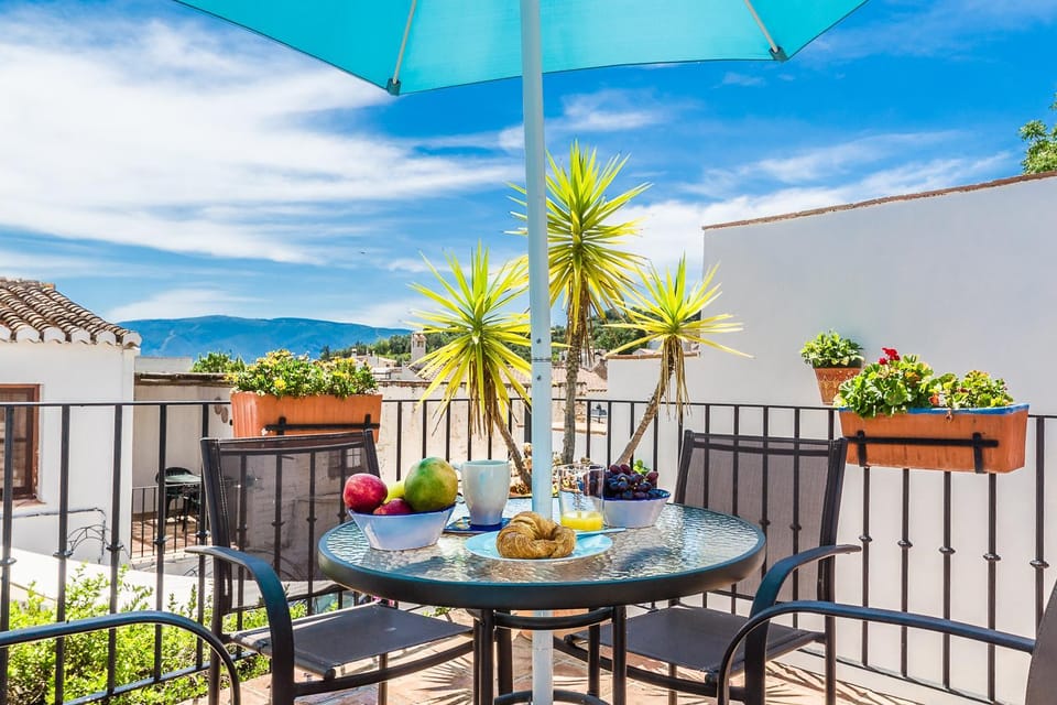 View (from property/room), Balcony/Terrace, Seating area, Mountain view, Pool view, Quiet street view