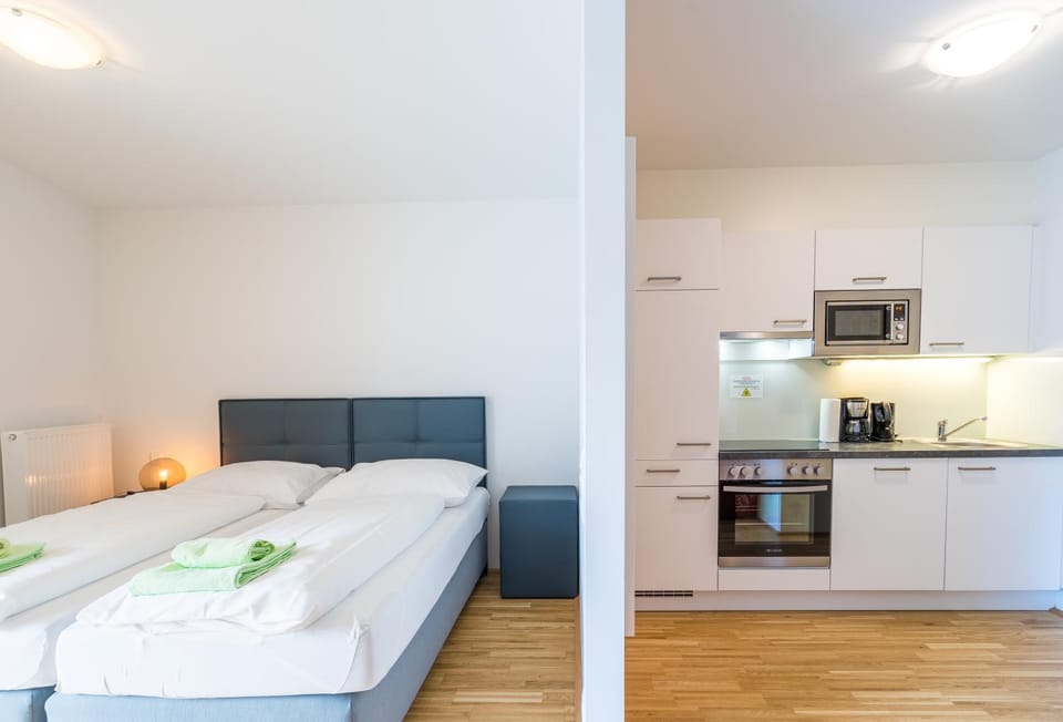Bed, Coffee/tea facilities, Kitchen or kitchenette, Bedroom, dishwasher, minibar, stove, towels, kitchen