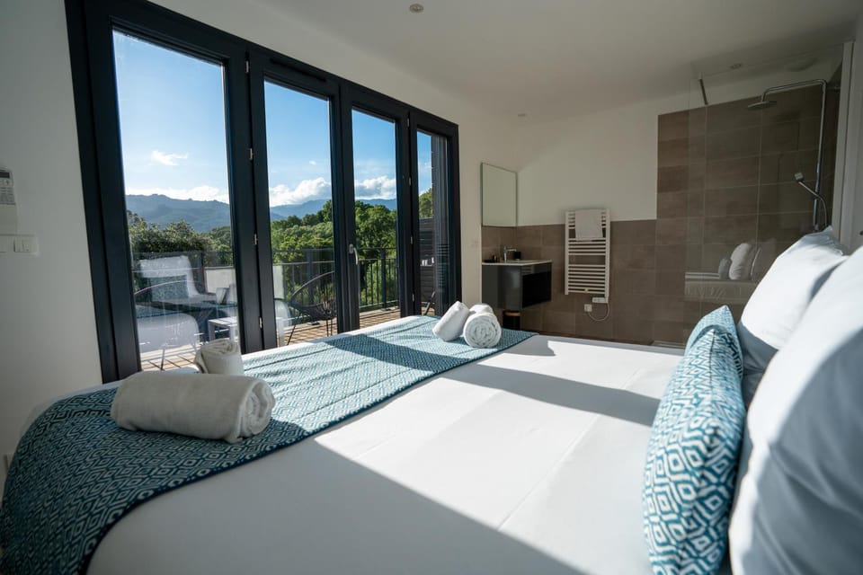 Shower, Bed, Natural landscape, Bathroom, Living room, Photo of the whole room, Seating area, Bedroom, Mountain view