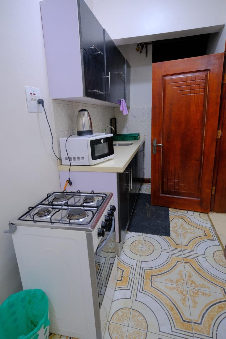 Kitchen or kitchenette, oven, stove