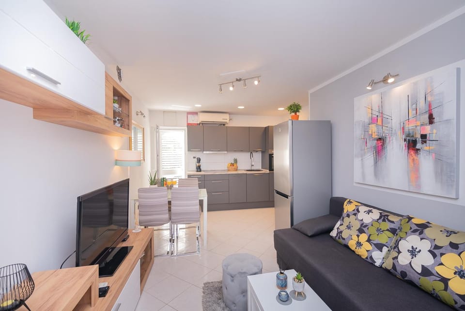 Living room, Seating area, Dining area, dishwasher, kitchen, air conditioner