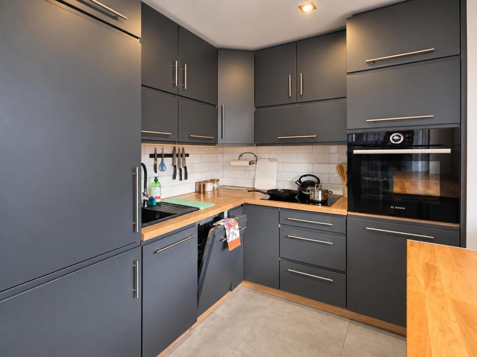 Kitchen or kitchenette, dishwasher, stove, kitchen