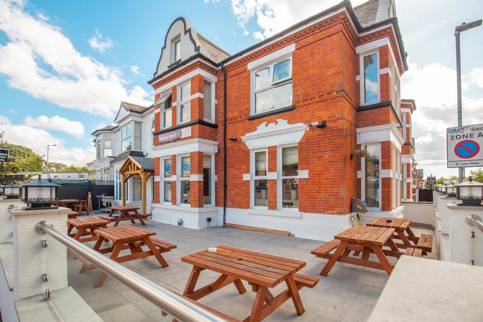 Property building, Patio, Day, Seating area