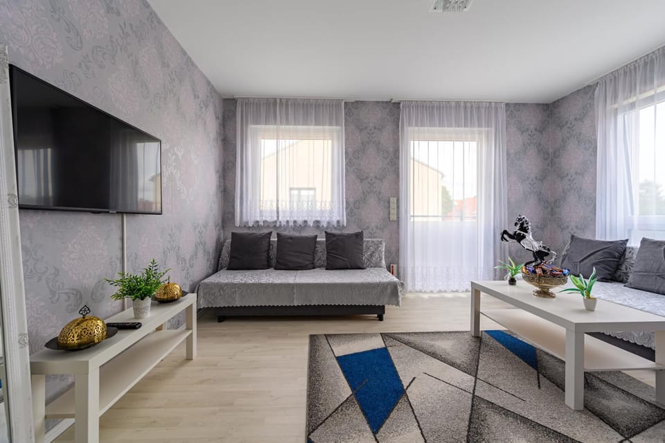 Bed, Living room, Seating area, Bedroom