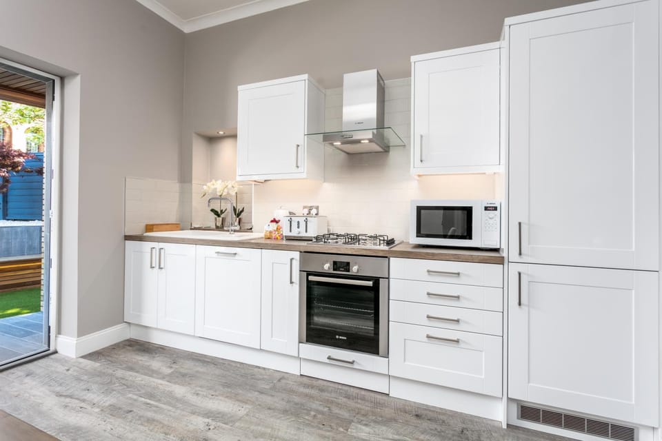 Kitchen or kitchenette, oven, stove, toaster