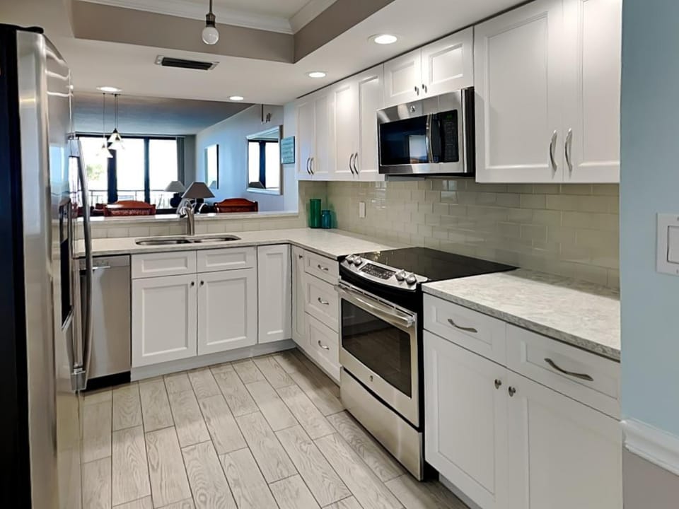 Kitchen or kitchenette, microwave, oven, stove, kitchen