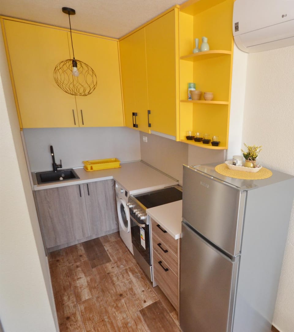 Kitchen or kitchenette, oven, stove