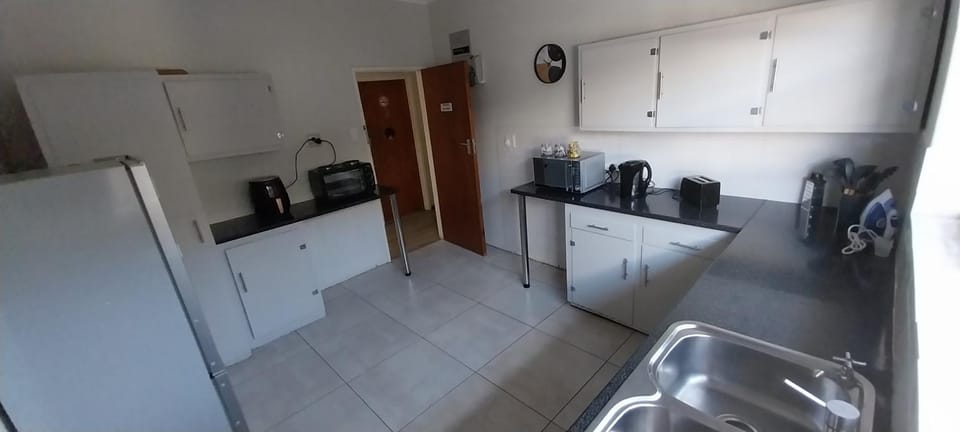 Kitchen or kitchenette, oven, stove, toaster