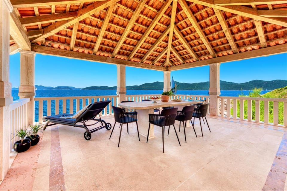 View (from property/room), Balcony/Terrace, Seating area, Dining area, Beach, Sea view