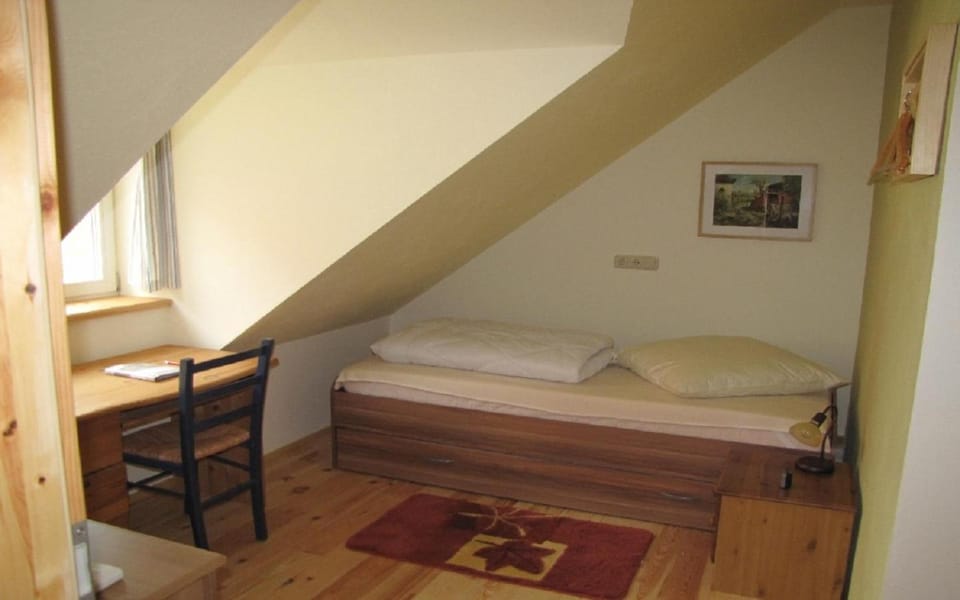 Bed, Seating area, Bedroom