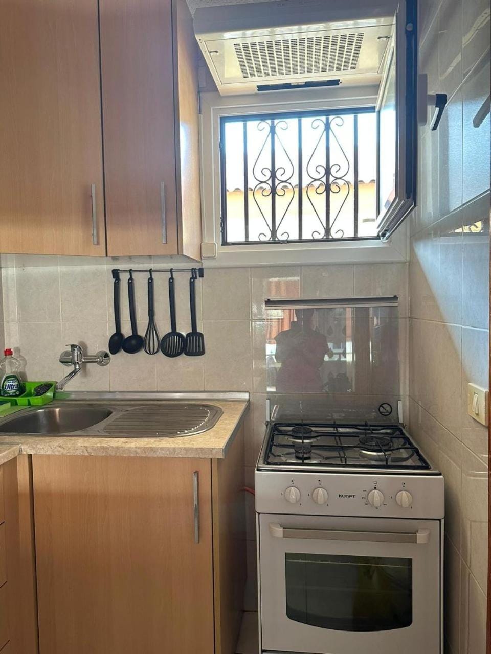 Kitchen or kitchenette, oven, stove