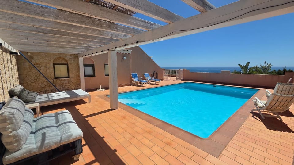 Swimming pool, sunbed