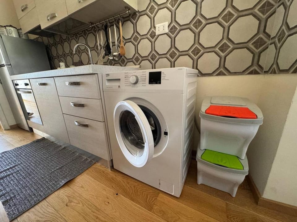 Kitchen or kitchenette, washing machine