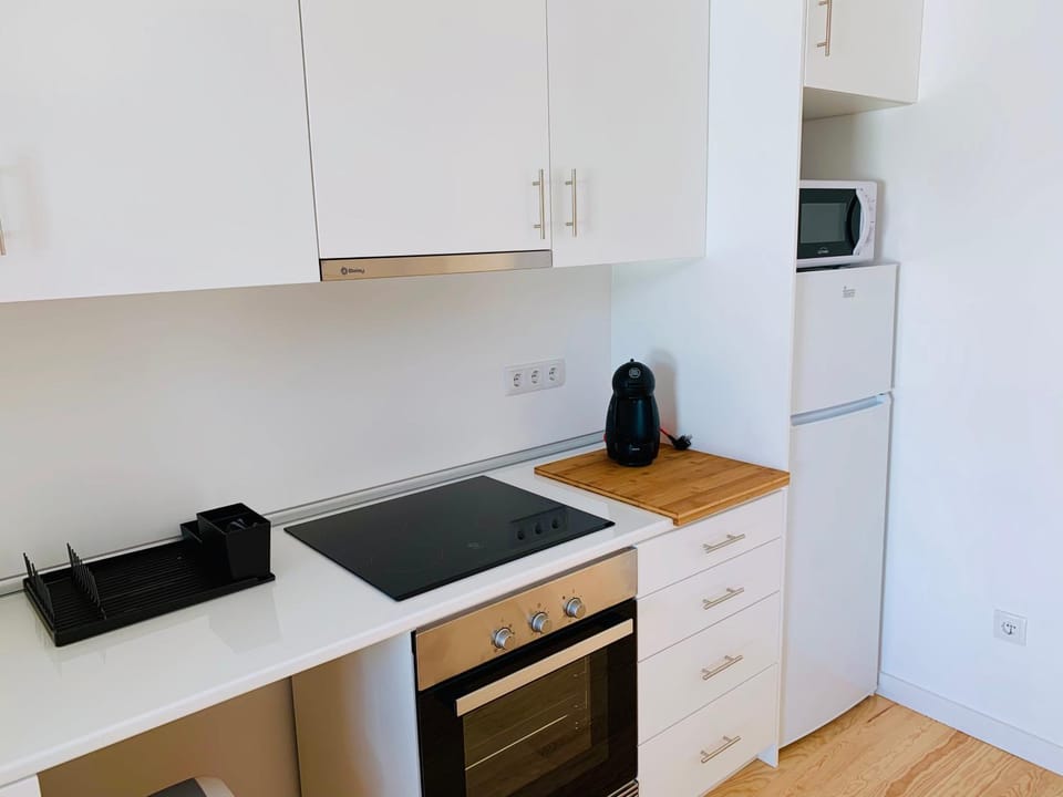 Kitchen or kitchenette, stove