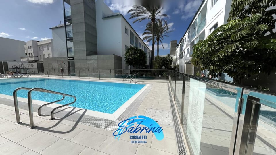Swimming pool, sunbed