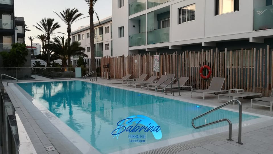 Swimming pool, sunbed