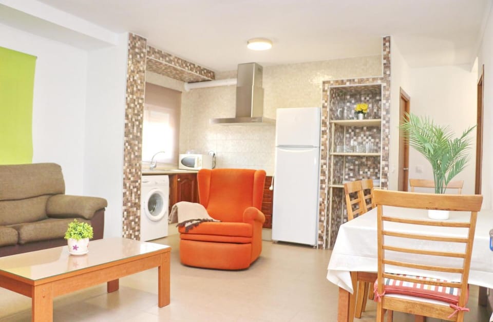 Dining area, minibar, washing machine, kitchen
