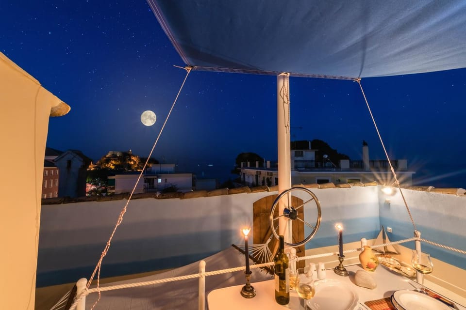 Patio, Night, Balcony/Terrace, Seating area, City view, Landmark view, Sea view