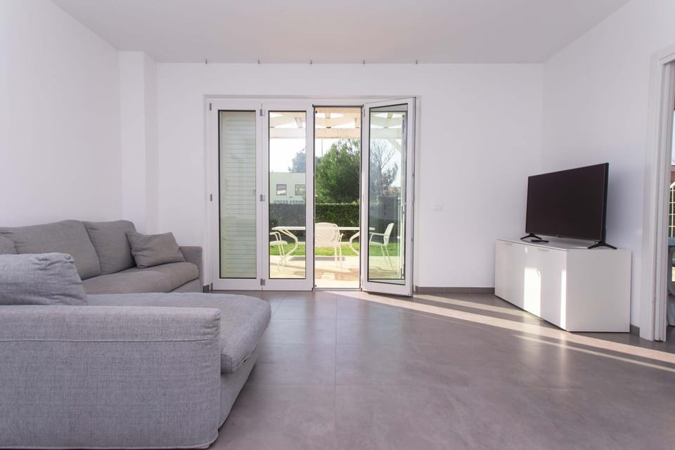 S018 - Sirolo, nuovissimo trilocale in pietra con giardino dx Apartment in Sirolo