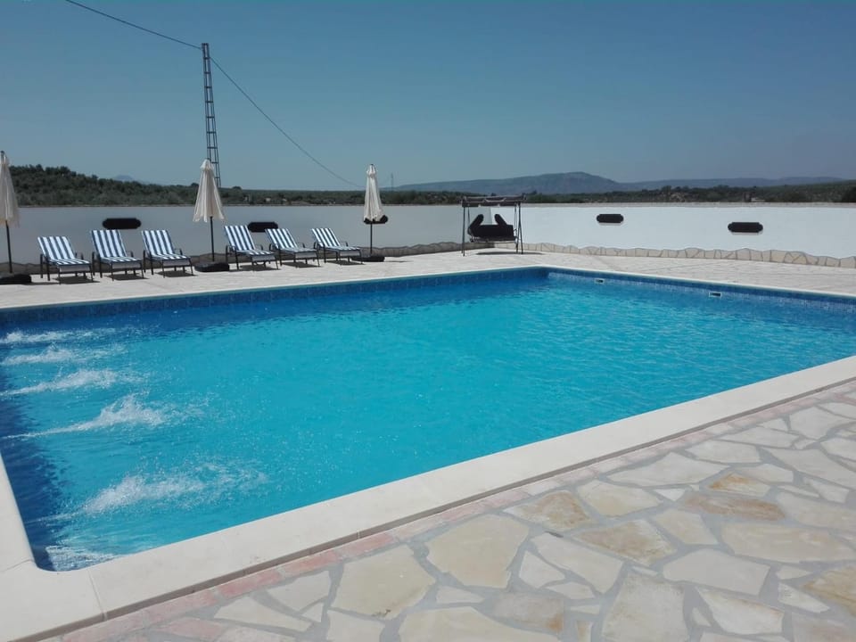 Natural landscape, Swimming pool, sunbed