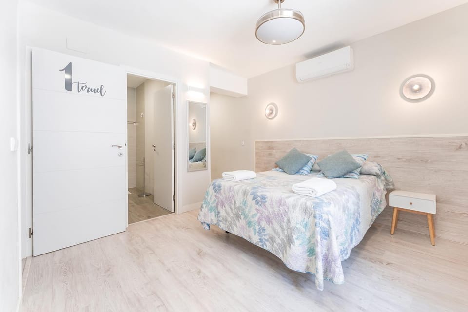 Bed, Photo of the whole room, Bedroom, towels, air conditioner