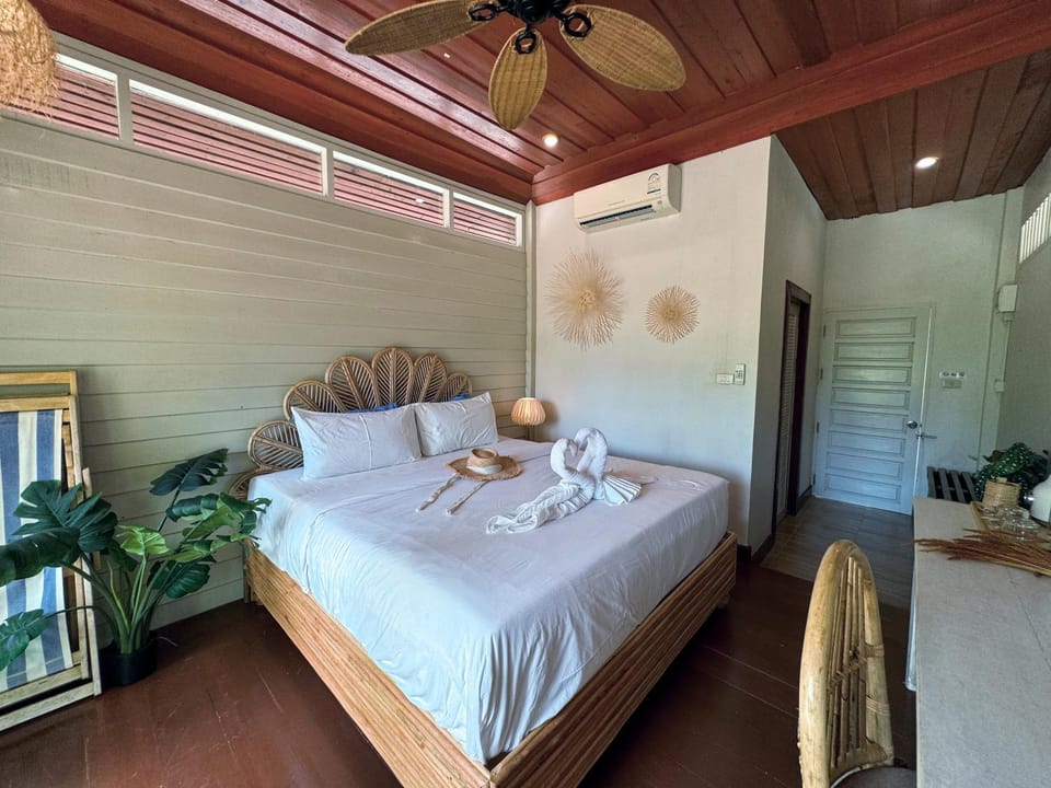Bed, Bedroom, fireplace, towels, air conditioner