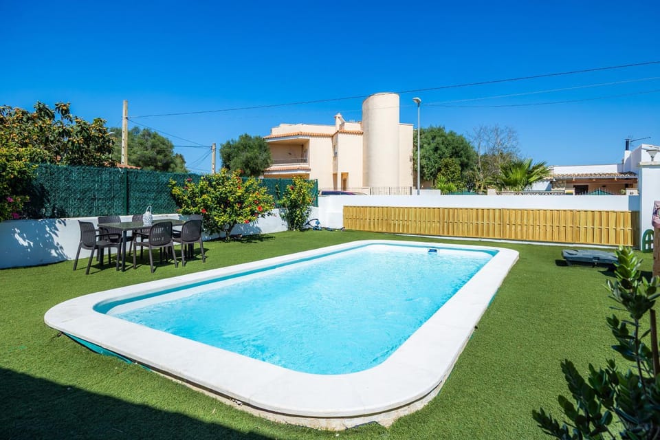Property building, Living room, Swimming pool