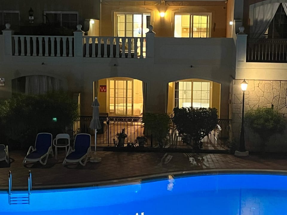 Property building, Night, Balcony/Terrace, Pool view, Swimming pool