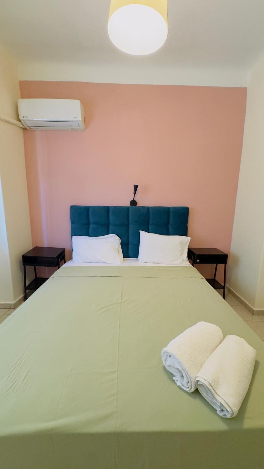 Bed, Photo of the whole room, Bedroom, towels, air conditioner