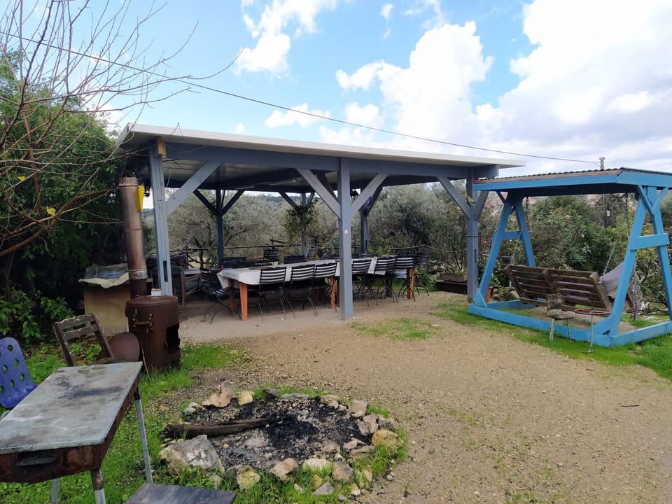 Property building, BBQ facilities, Seating area