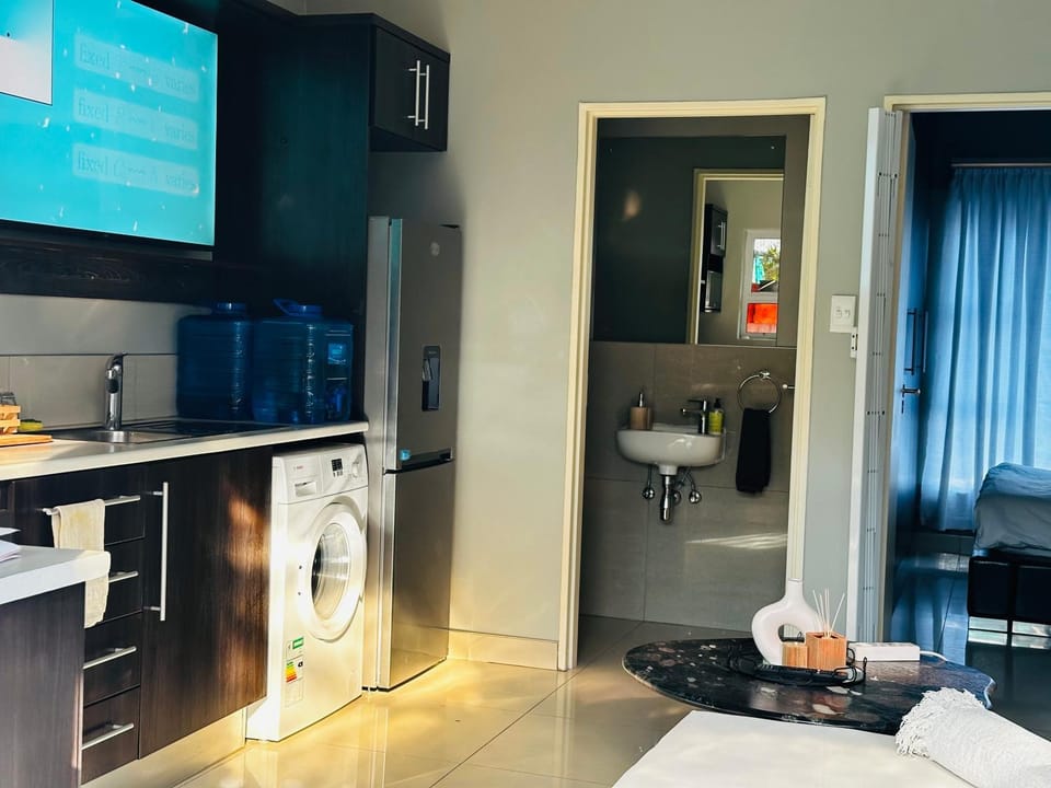 Kitchen or kitchenette, washing machine
