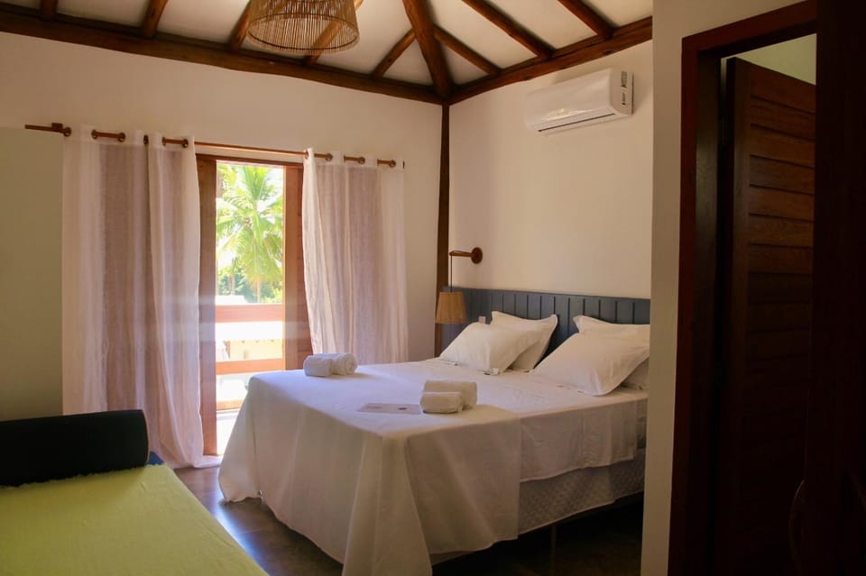 Bed, Photo of the whole room, Bedroom, towels, air conditioner