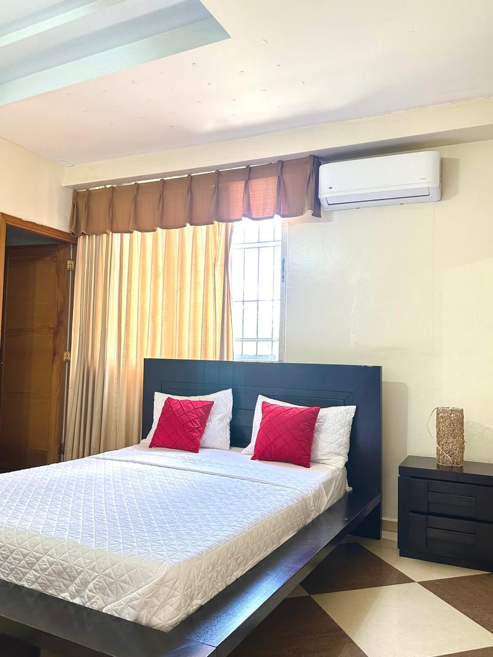 Photo of the whole room, air conditioner