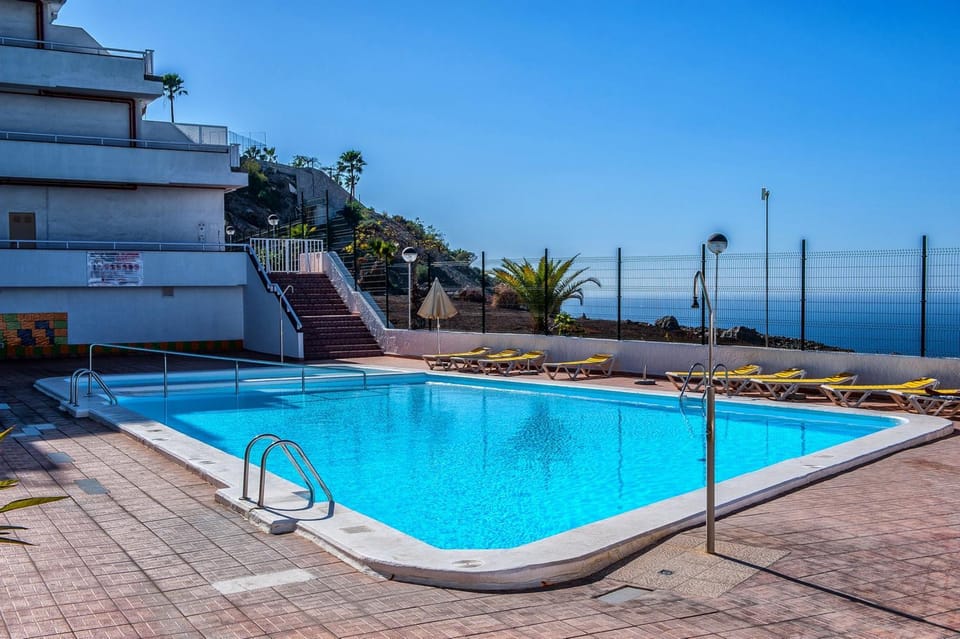 Apartment with big pool and sea view Apartment in Puerto Rico de Gran Canaria