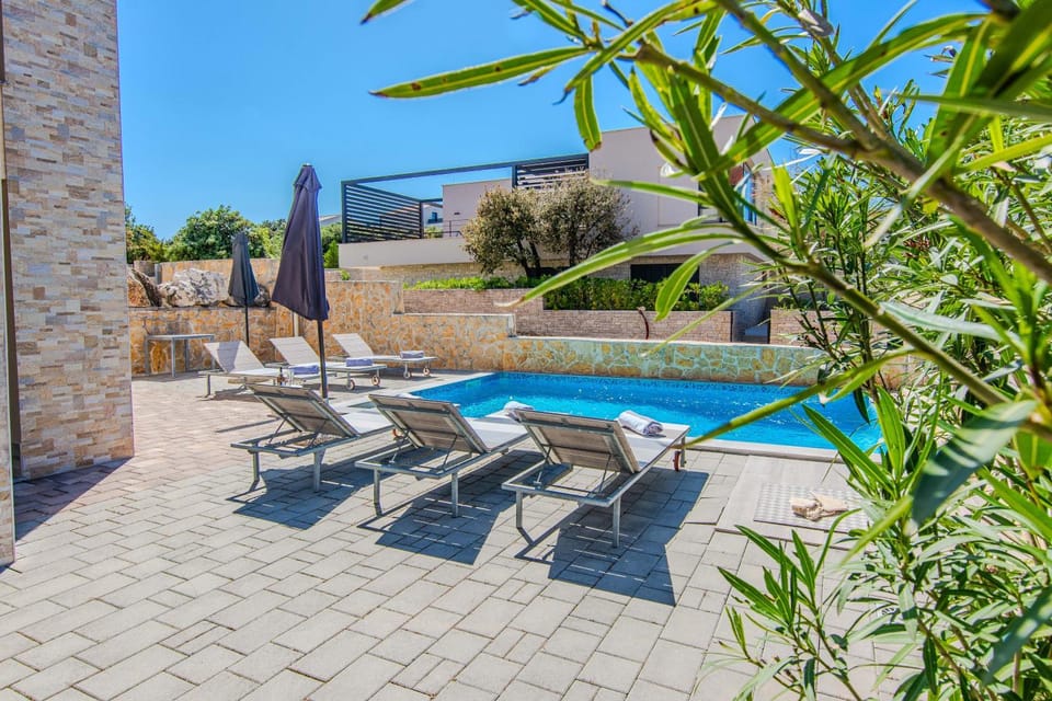 Patio, Day, Pool view, Swimming pool, sunbed