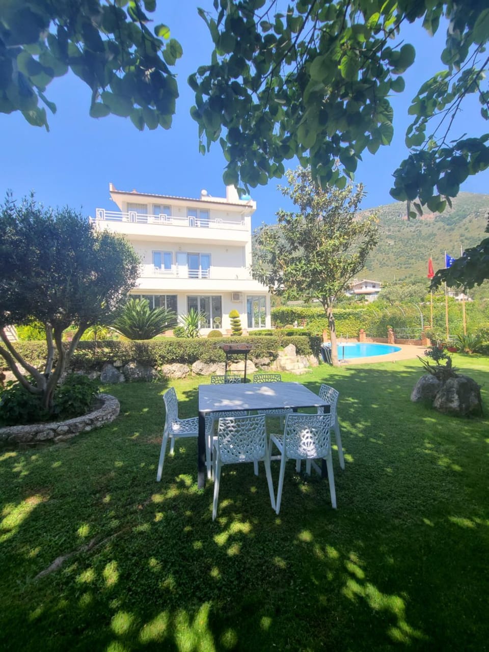 Property building, Natural landscape, Dining area, Garden view, Mountain view, Swimming pool