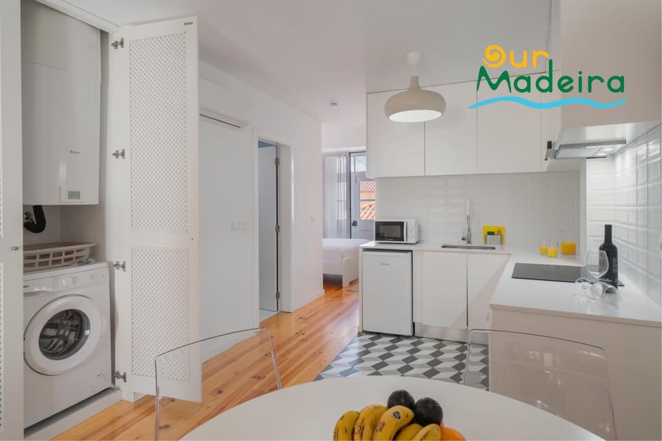Kitchen or kitchenette, washing machine