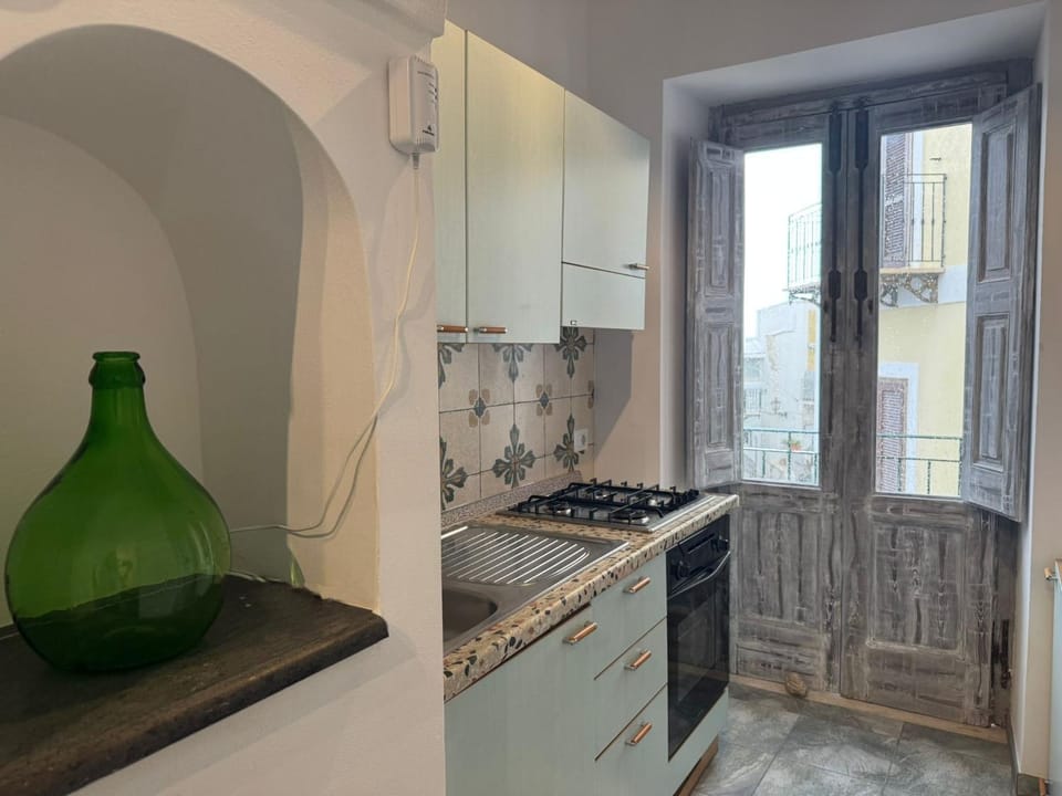 Kitchen or kitchenette, stove