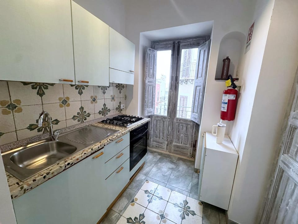 Kitchen or kitchenette, oven, stove