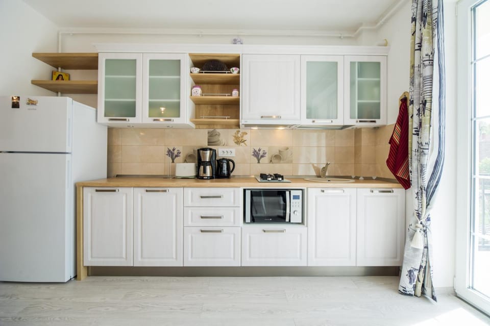 Coffee/tea facilities, Kitchen or kitchenette, minibar, stove, toaster