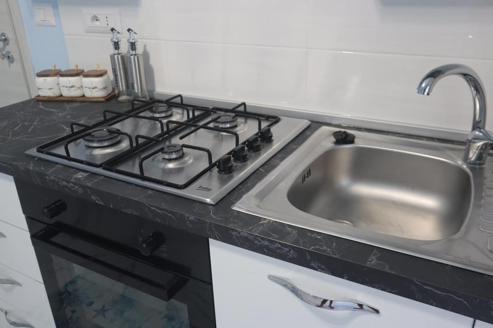 Kitchen or kitchenette, stove
