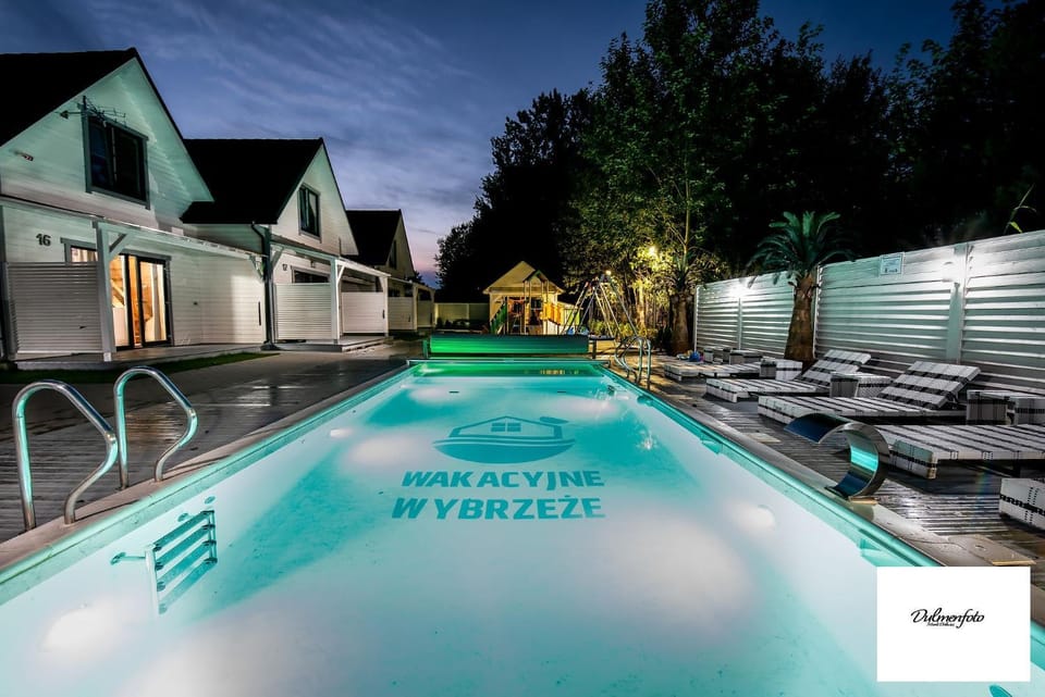 Property building, Night, Property logo or sign, Property logo or sign, Property logo or sign, Pool view, sunbed, sunbed