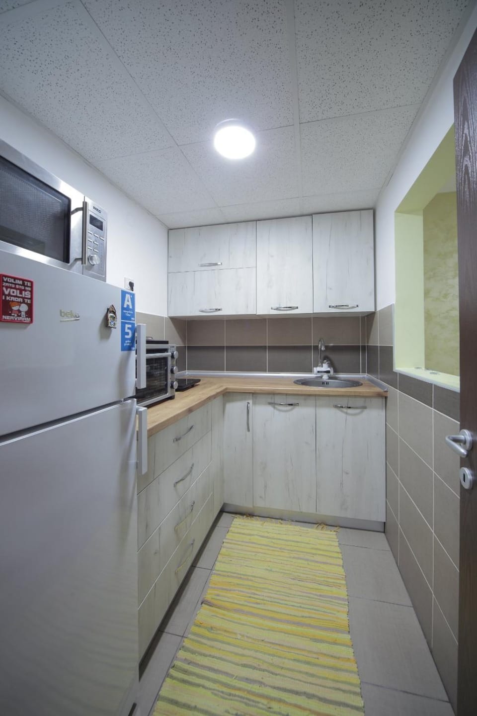 Kitchen or kitchenette, oven, stove