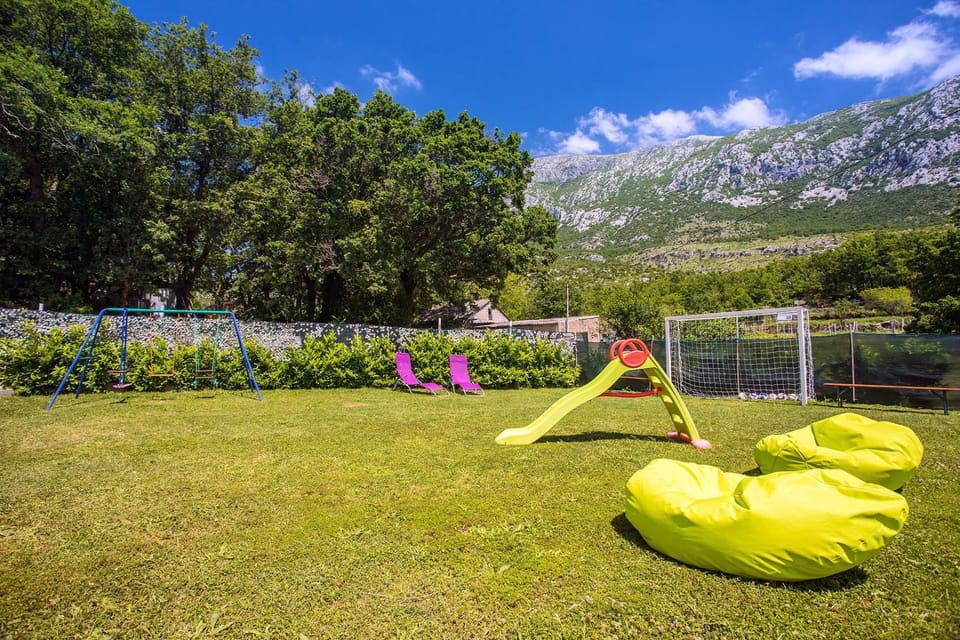 Property building, BBQ facilities, Children play ground, Garden, View (from property/room), Balcony/Terrace, Seating area, Dining area, Cycling, Mountain view, Swimming pool