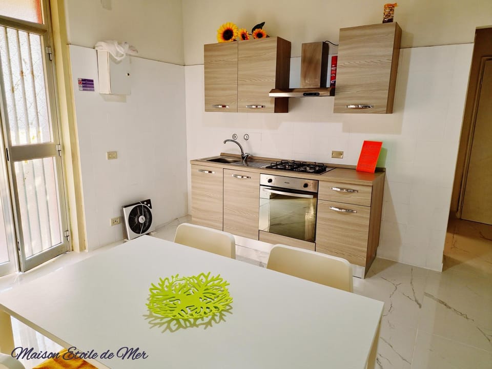 Kitchen or kitchenette, oven, stove